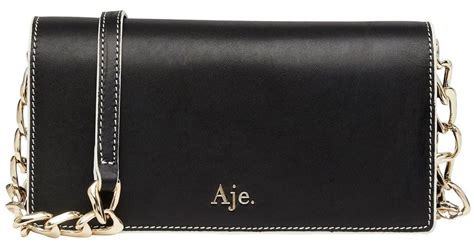 aje oasis chain clutch bag.